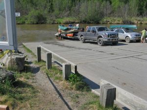 car backing boat into water