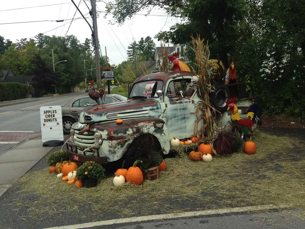 old school truck decorated with fall themed objects